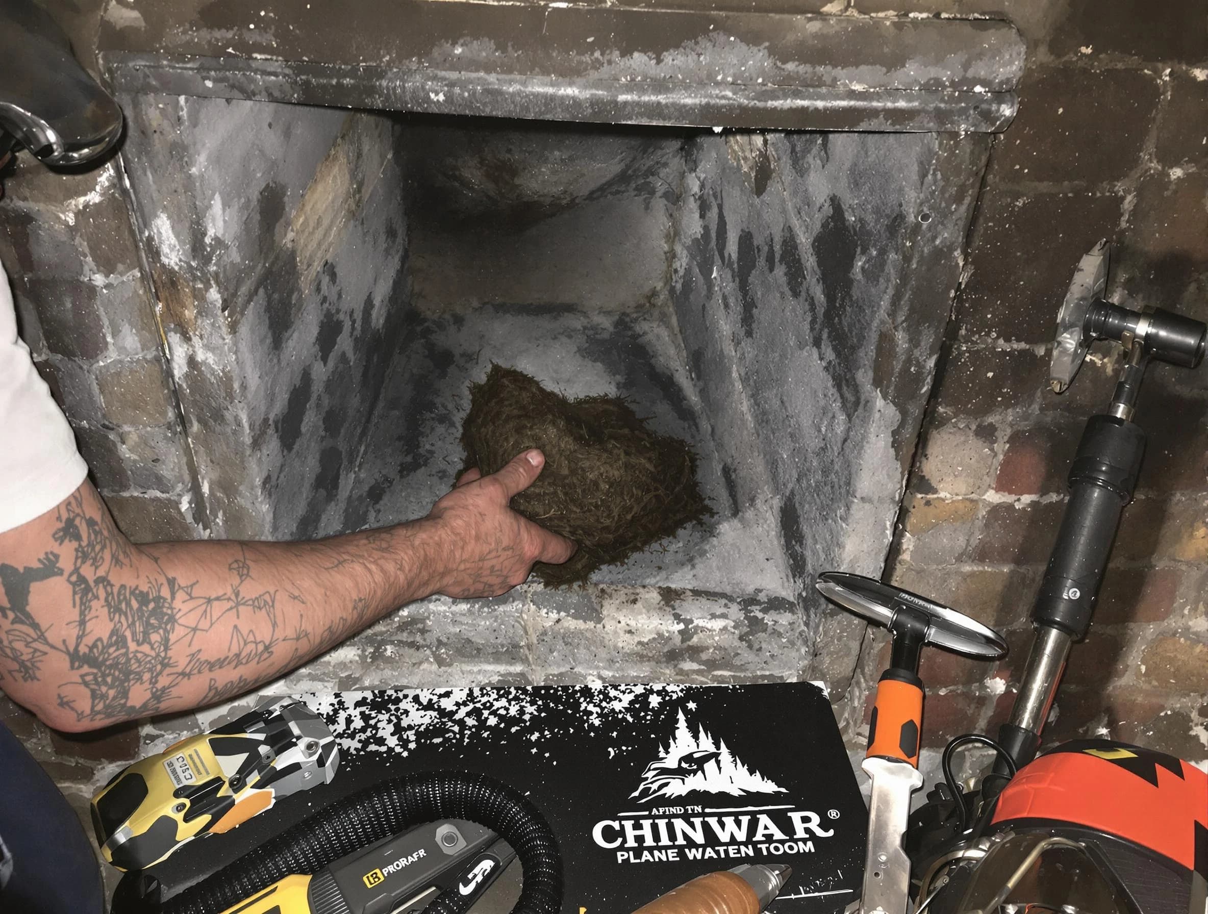 Buffalo Chimney Sweep safely removing debris and screening chimney in Buffalo, PA